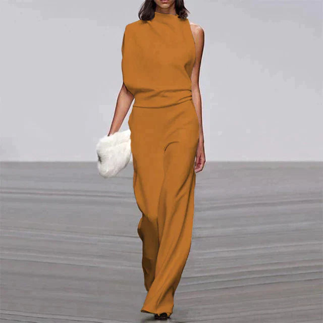 Sommerlig dame jumpsuit, løs og ermeløs. Komfortabel og elegant ensfarget kvinneoverall for varme dager.