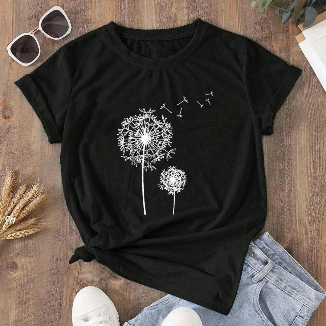 Naturinspirert t-skjorte for dame. Myk og komfortabel med vakkert løvetann design.