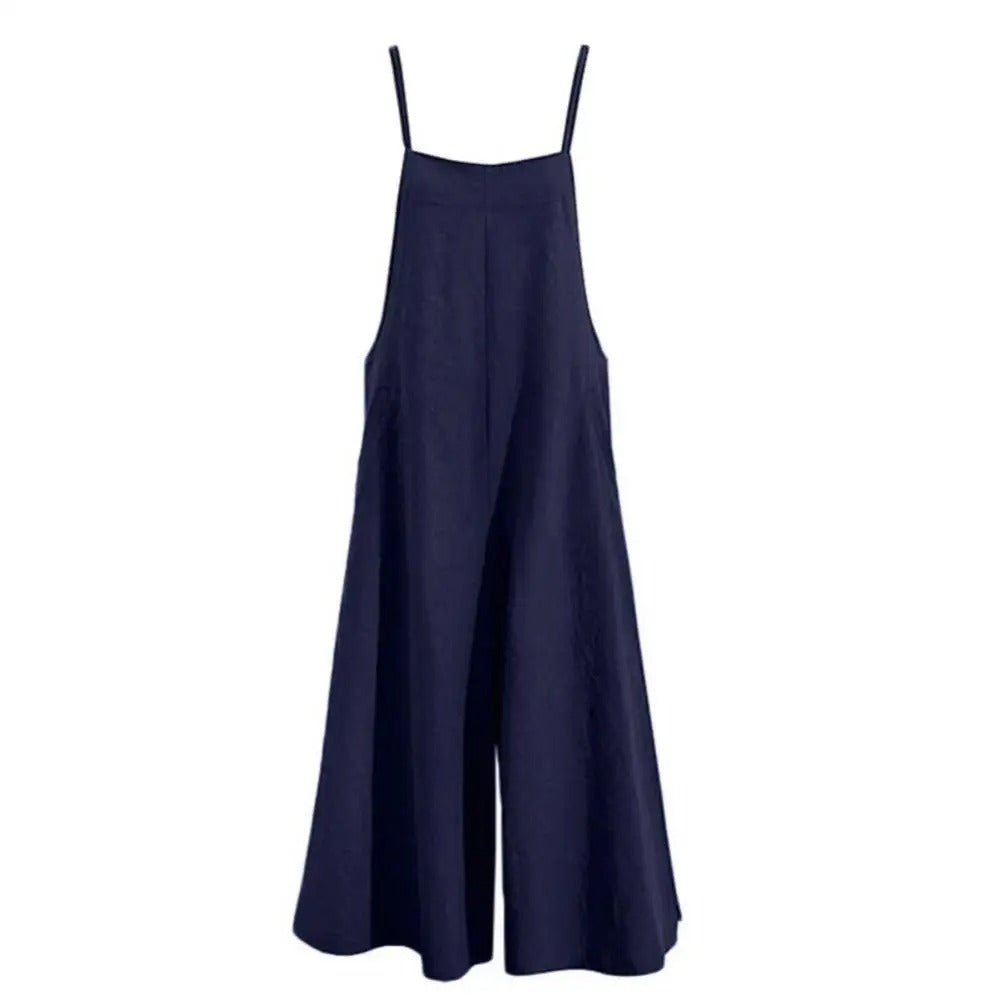 Elegant ermeløs damejumpsuit for kvinner. Løs passform, vide ben. Komfortabel for sommer og hverdag.
