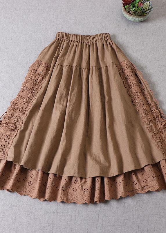 Rynket høstskjørt i patchwork for dame. Komfortabelt, elegant, i beige og brun. Ideelt for kvinnemote.