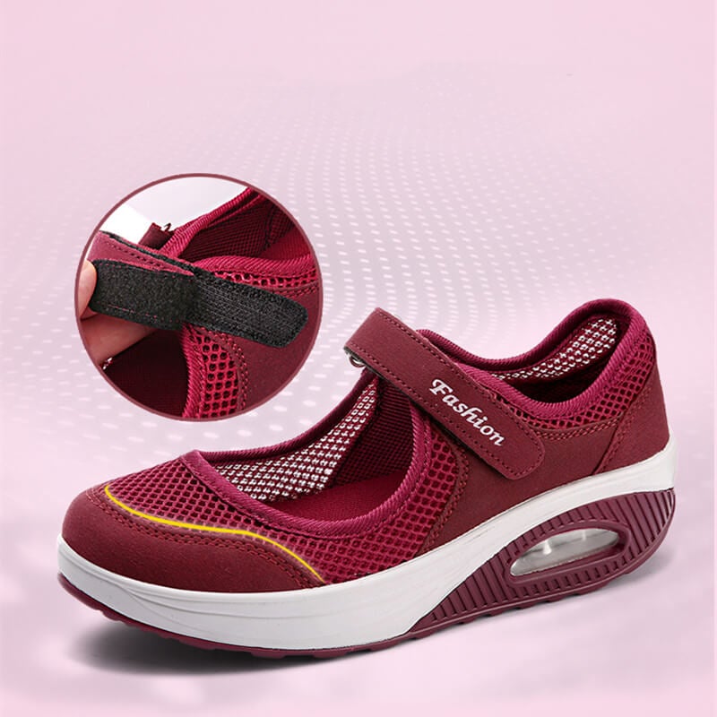Pustende lettvektsko: Blå sneakers for kvinner med moderne design, ideelle for fritidsaktiviteter.