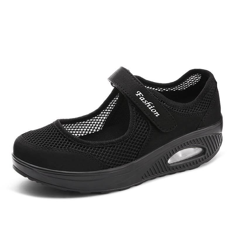 Komfortable sneakers: Mørkeblå damesko med pustende stoff, perfekt for en aktiv livsstil.