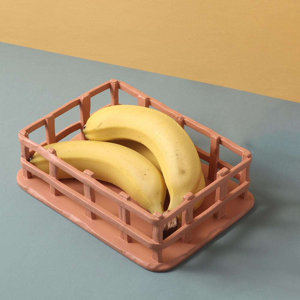 Miljøvennlig fruktskål i harpiks med nordisk, minimalistisk design. Flott til hjemmedekor og kjøkken.