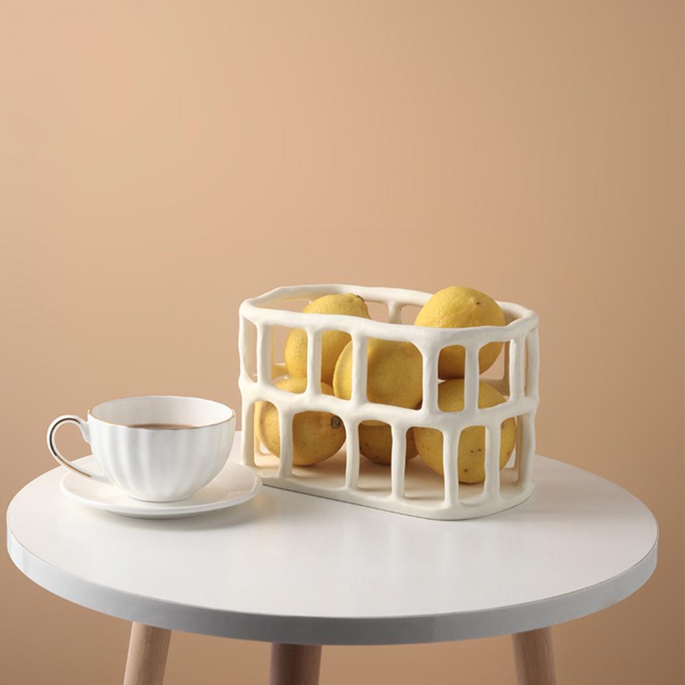 Gaveide: Dekorativ fruktskål i nordisk stil. Miljøvennlig harpiks, minimalistisk design for moderne hjem.