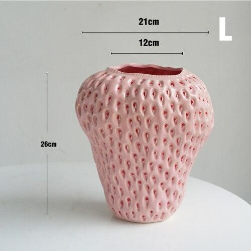 Unik jordbær vase for friske blomster eller grønne planter. En iøynefallende interiørdetalj.
