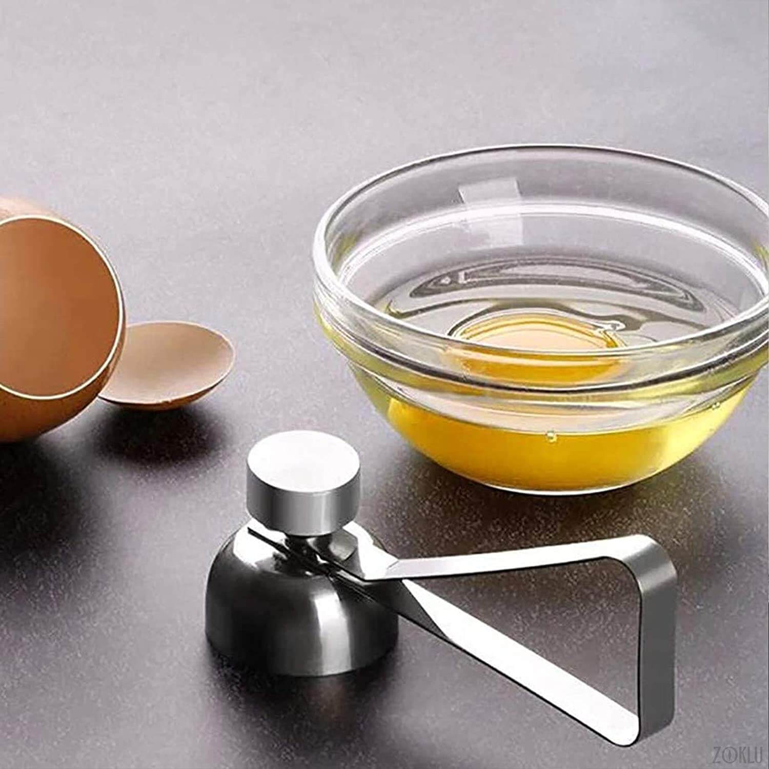 Detaljbilde av eggeknekkerens mekanisme, viser den smarte utformingen for presis eggeåpning.