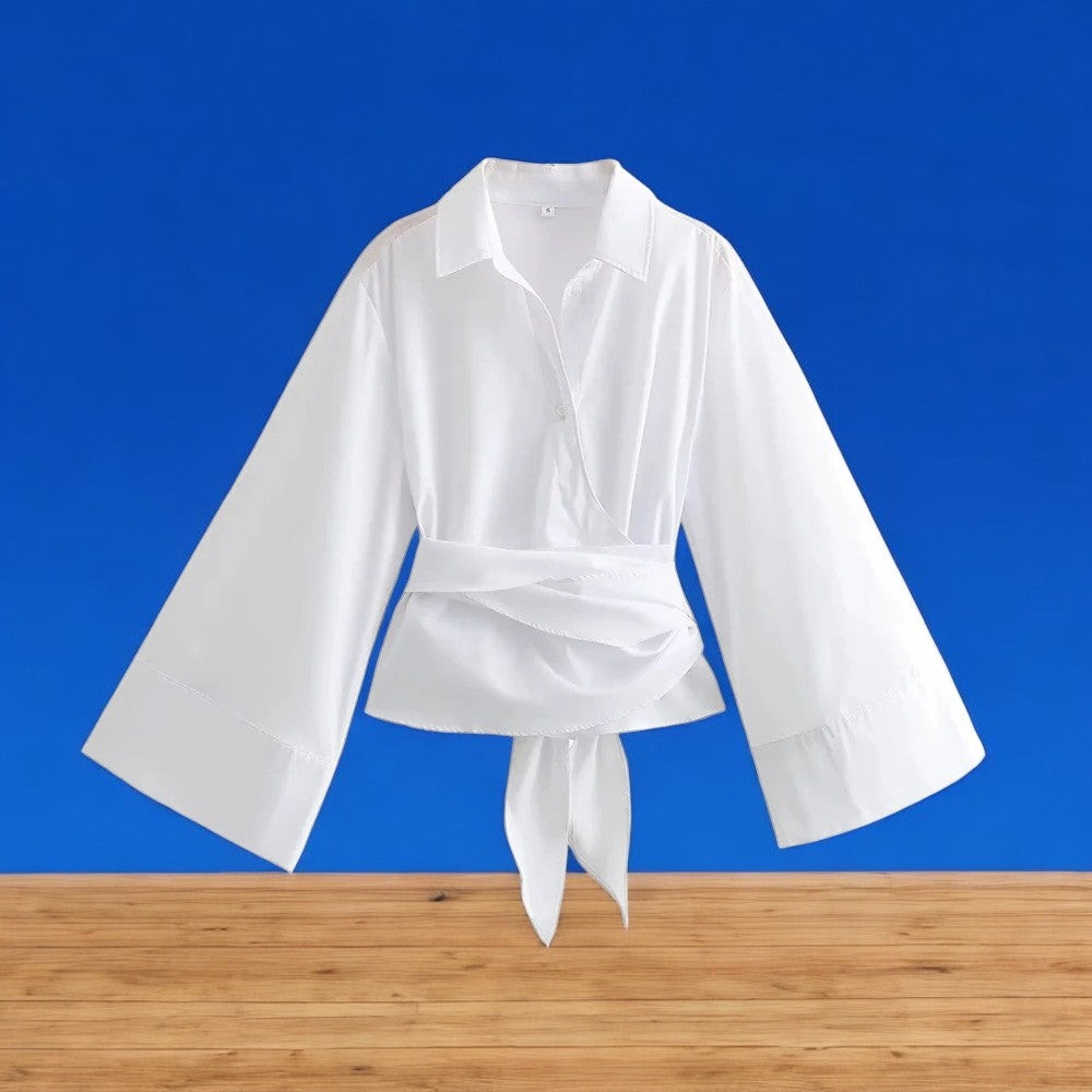 Mote for kvinner: langermet kimonobluse med et unikt snitt og elegant sløyfedetalj for en raffinert look.