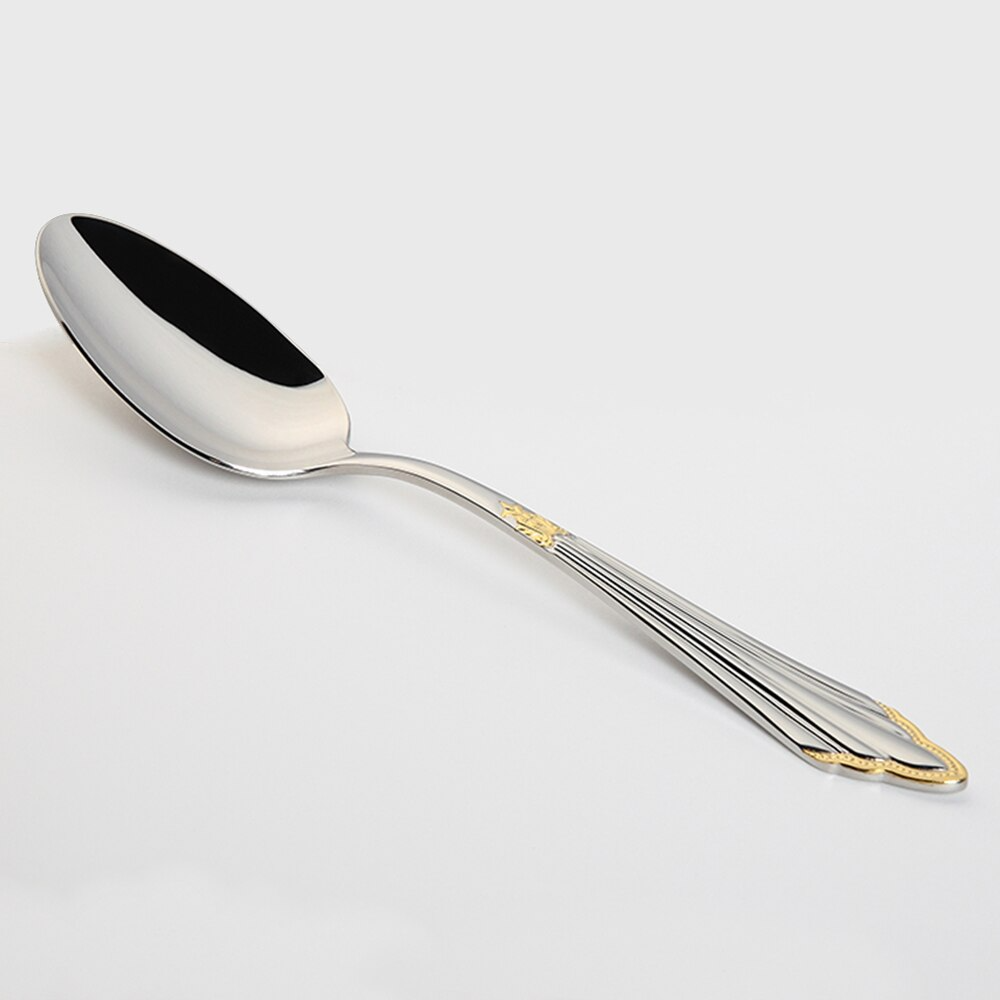Glansfullt bestikksett i rustfritt stål, fremhever høy kvalitet og elegant design for middag.
