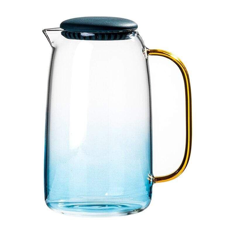 Elegant blå glasskaraffelsett med drikkeglass for servering av vann eller juice. Perfekt til kjøkkenet.