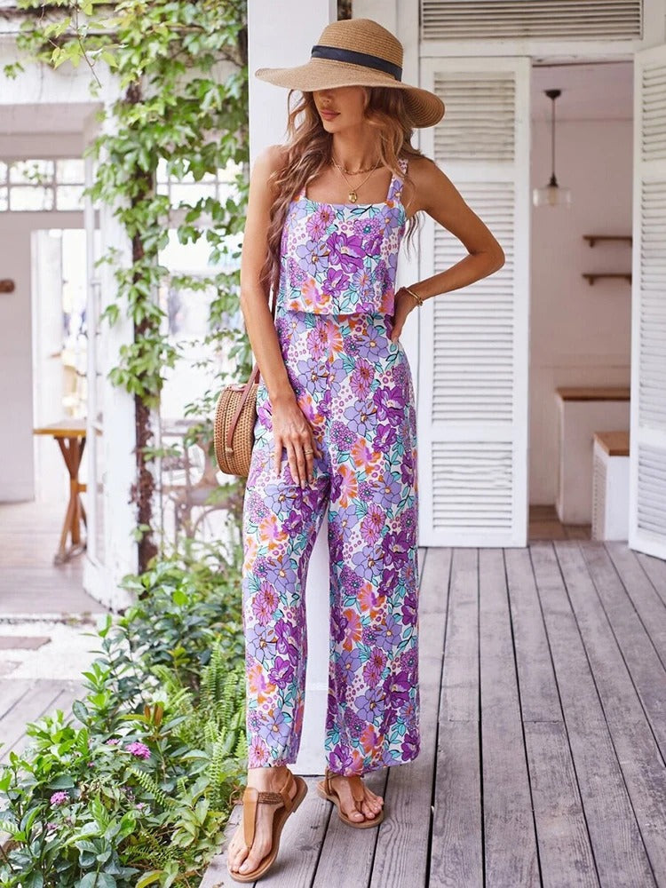 Stilig ryggløs blomstertrykk romper for kvinner. Perfekt for varme sommerdager med sin luftige passform.