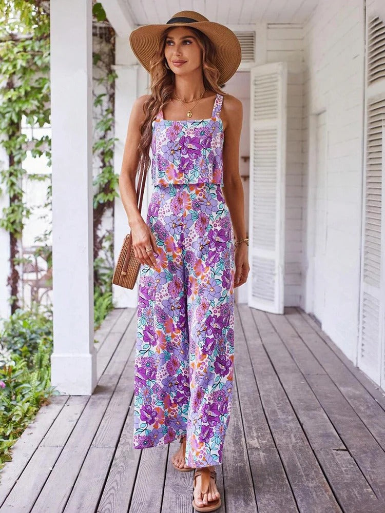 Trendy blomstertrykk romper for kvinner i oransje og lilla, ryggløs og med vide ben, for sommeren.