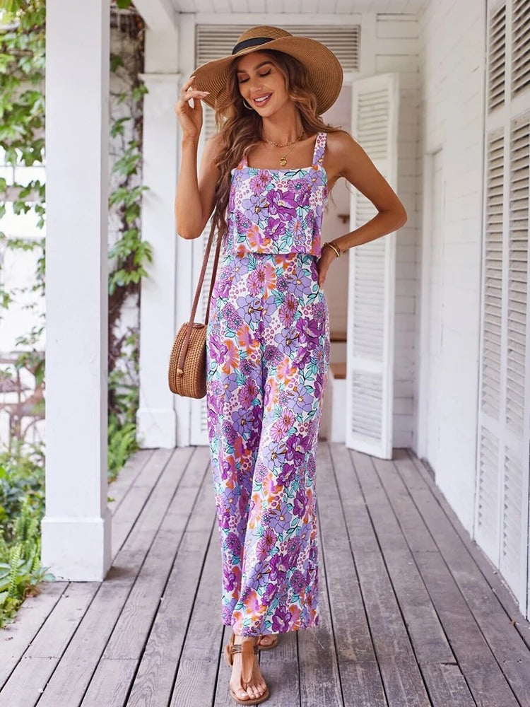 Kvinner elegant sommerromper med blomstertrykk, ryggløs design for en komfortabel og moteriktig stil.