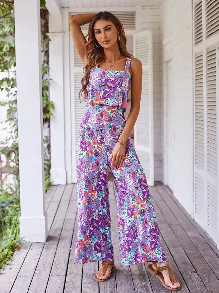 Luftig og komfortabel blomstertrykk romper for kvinner, ryggløs og perfekt for sommerens festligheter.