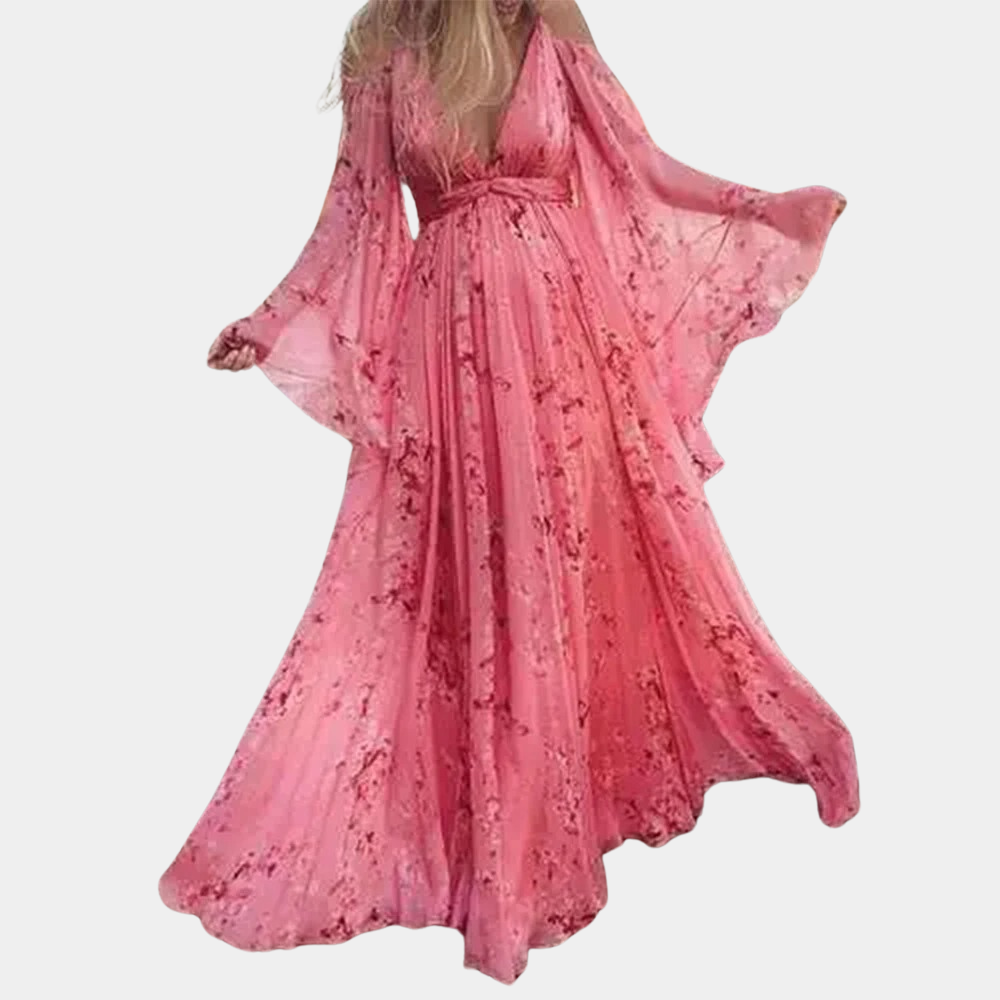"Elegant blomstrete maxikjole med paisleymønster og blondekanter, perfekt for sommerlige anledninger og elegante sammenkomste