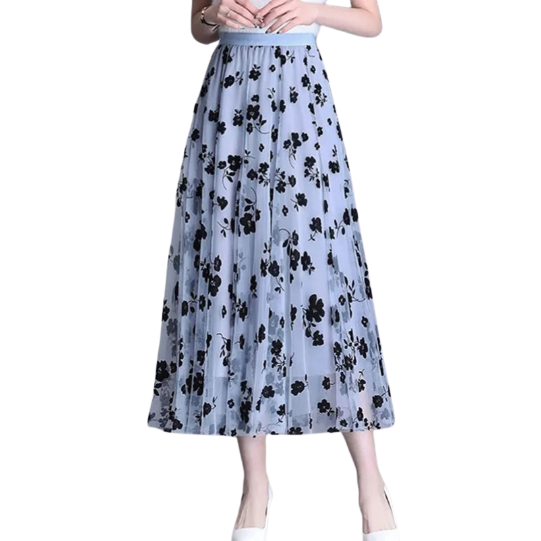 Grått blomstrete midiskjørt med delikat mønster. Et allsidig og elegant dameskjørt for en stilfull look.