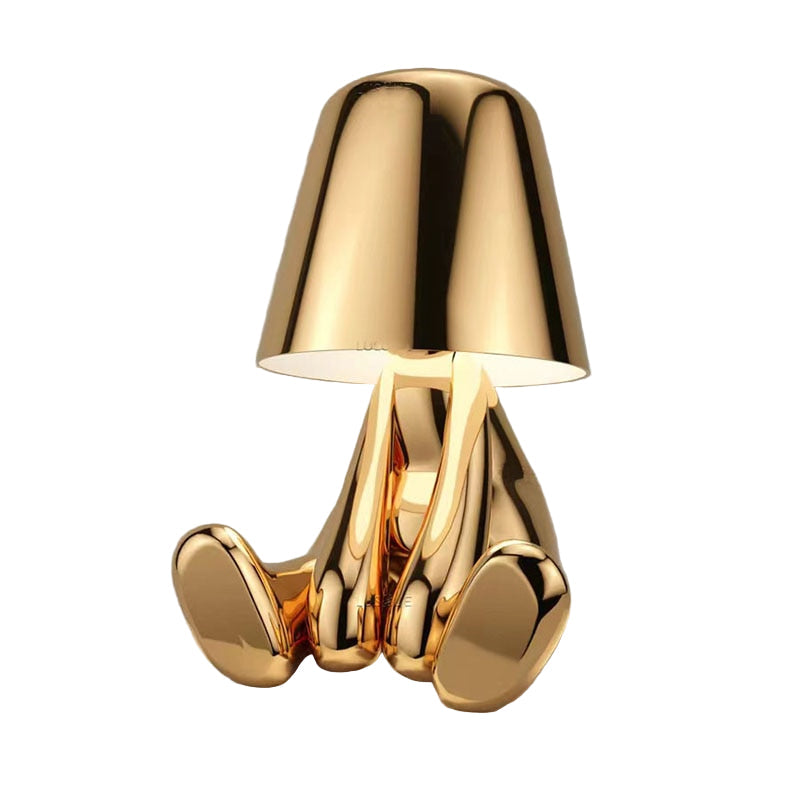Elegant bordlampe med unikt design, perfekt for koselig stuebelysning og moderne hjemmeinnredning.