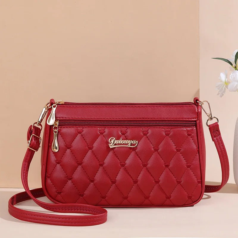 Moteveske: Brodert crossbody-veske i PU-skinn, en elegant følgesvenn for enhver anledning for kvinner.