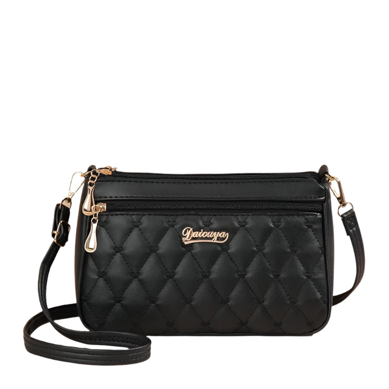 Frontvisning av brodert crossbody-veske for kvinner, PU-skinn, ideell for utflukter.