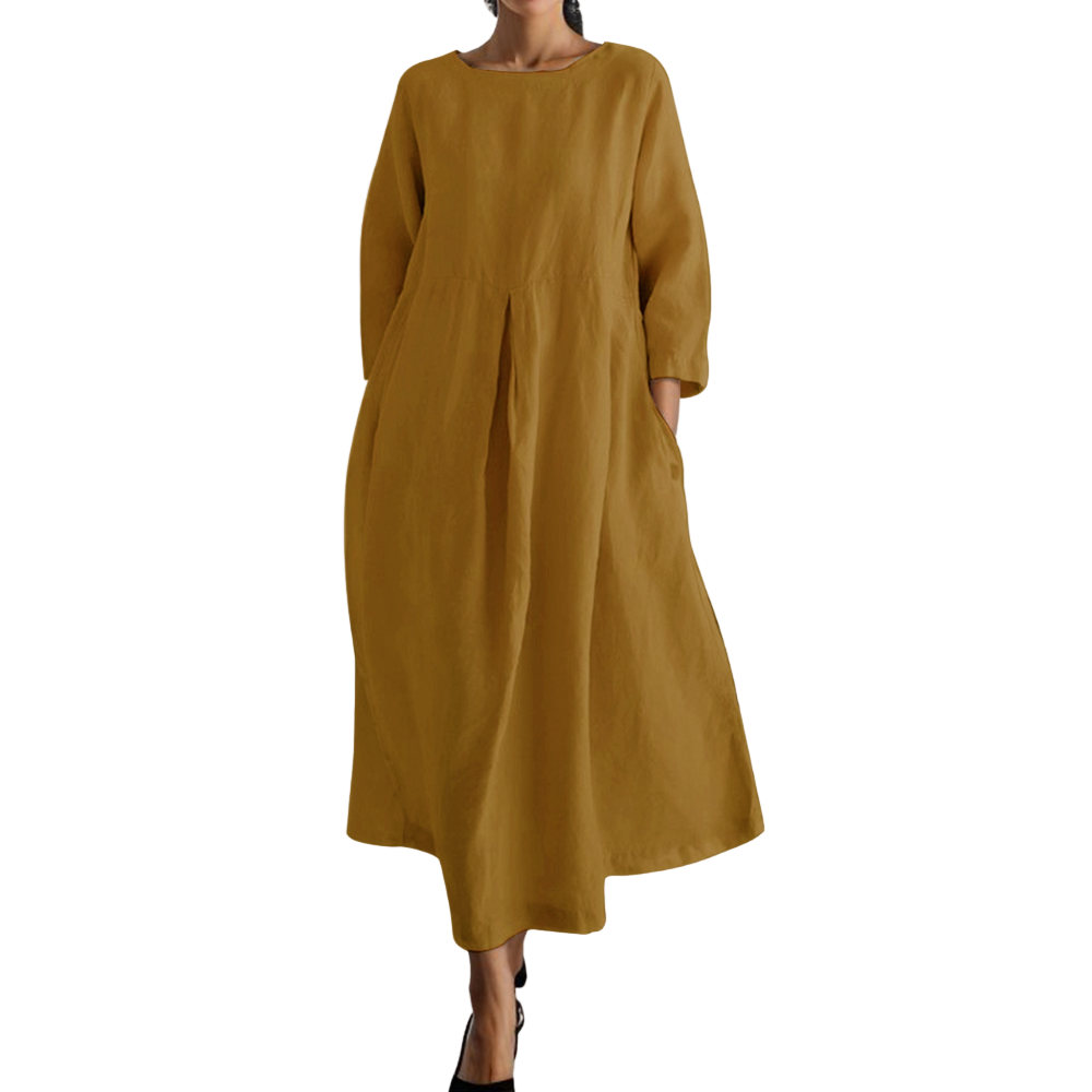 Elegant brun sommerkjole for kvinner, med flatterende passform. Perfekt for en stilfull sommerlook.