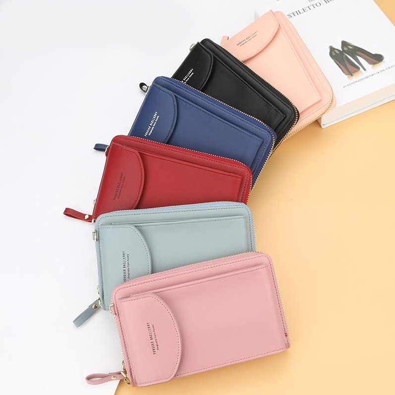 Kvinners stilige håndveske crossbody, svart skinn, kompakt og praktisk for en moderne livsstil.