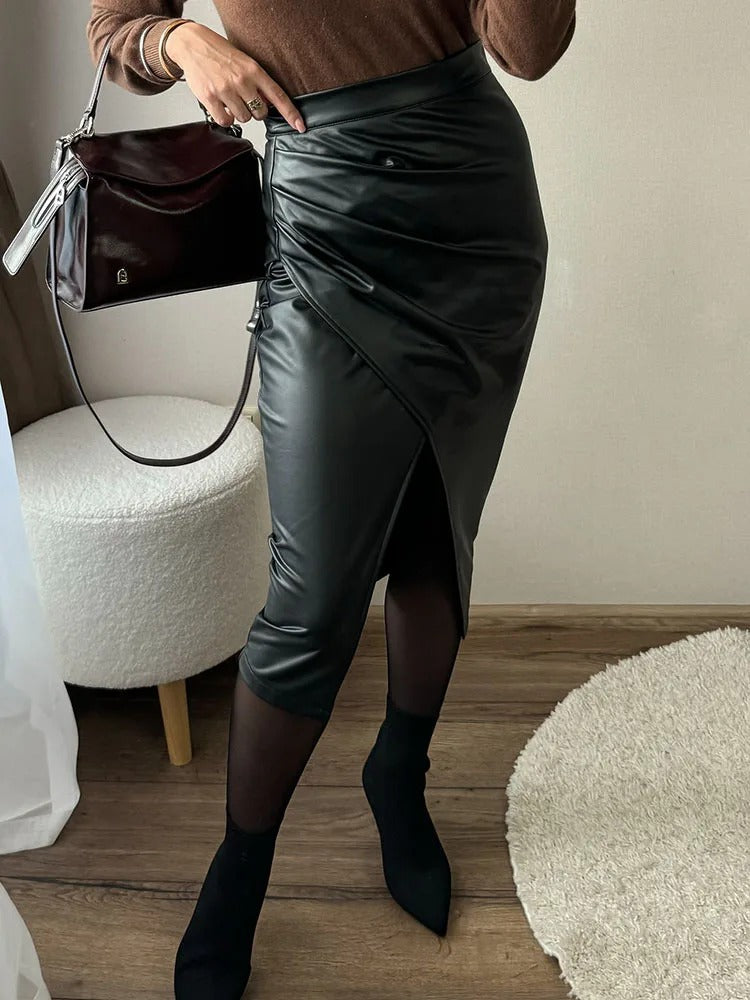Elegant midiskjørt for dame i tidløs stil med høy midje. Allsidig skjørt for både fest og hverdag.