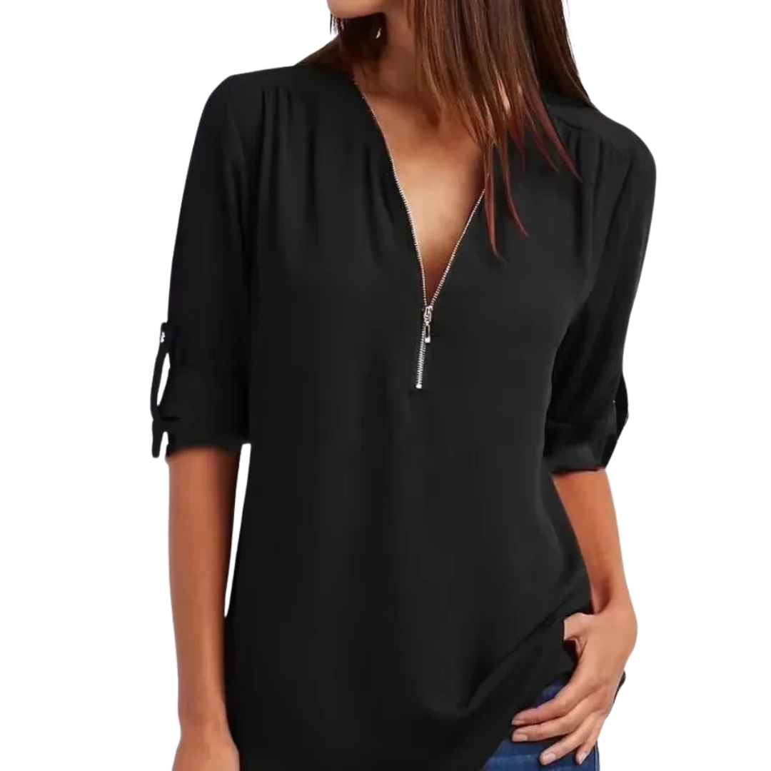 Elegant damebluse med dyp V-hals, komfortabel passform for hverdagsbruk.