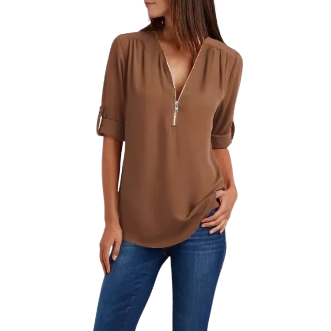 Elegant kvinner bluse med dyp V-hals, perfekt for en komfortabel og stilig look.