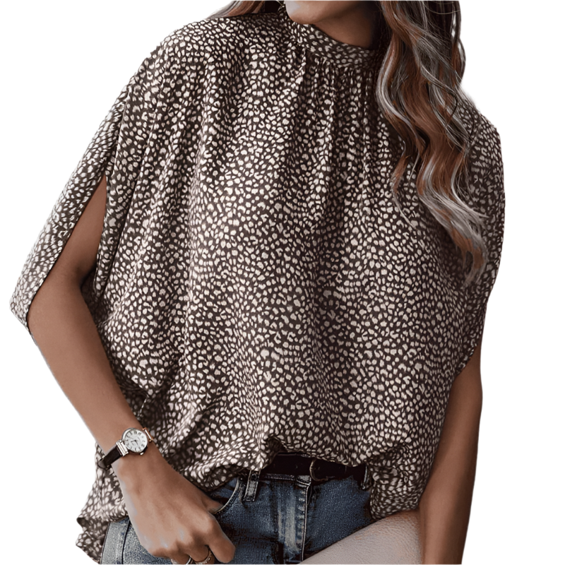 Elegant damebluse med halvlange ermer og stilige splittdetaljer. Perfekt for hverdag og kontor.