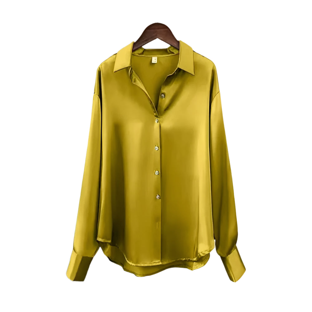 Stilren og moderne damebluse med reverskrage, perfekt for en profesjonell eller uformell look.