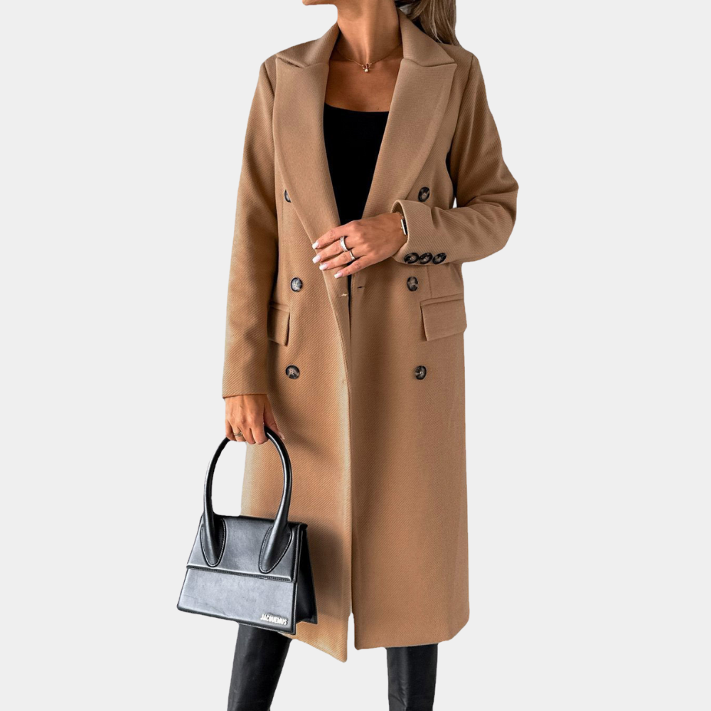 Damejakke som viser tidløs eleganse og komfort. Perfekt som stilfullt og beskyttende yttertøy til høst/vinter.