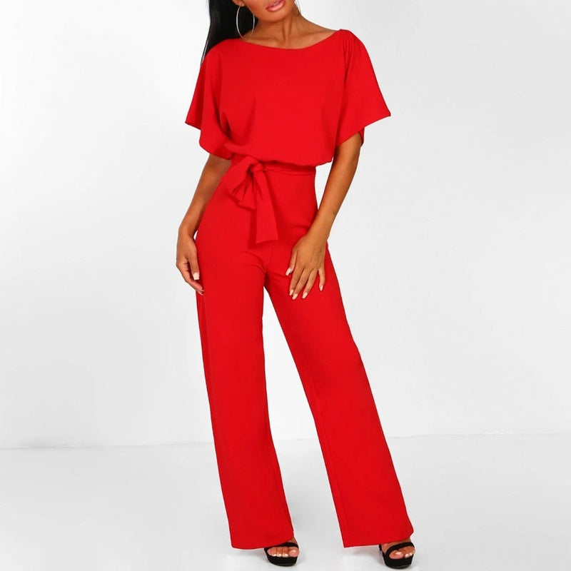 Ryggvisning av elegant damejumpsuit med snøring i midjen. Fremhever komfortabelt stoff og vide ben.
