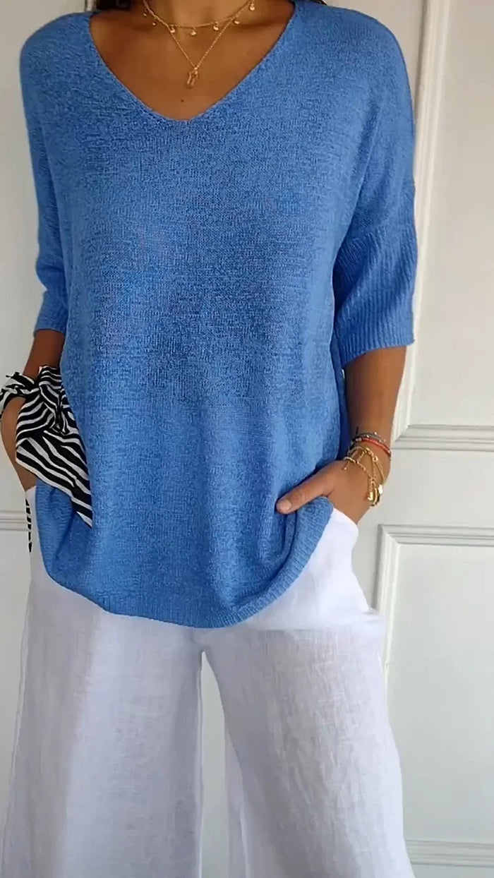 Allsidig kvinnebluse med V-hals, perfekt for lag-på-lag eller som en enkel, elegant dametopp.