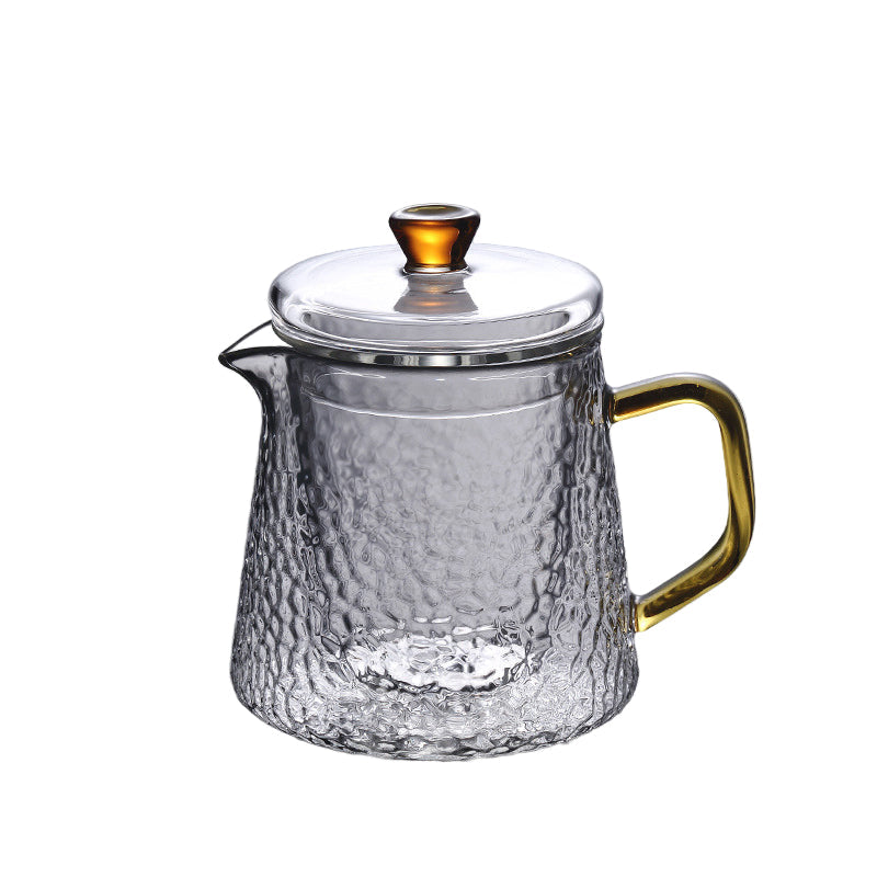 Elegant glass tekanne med infuser for perfekt tebrygging og servering hjemme.