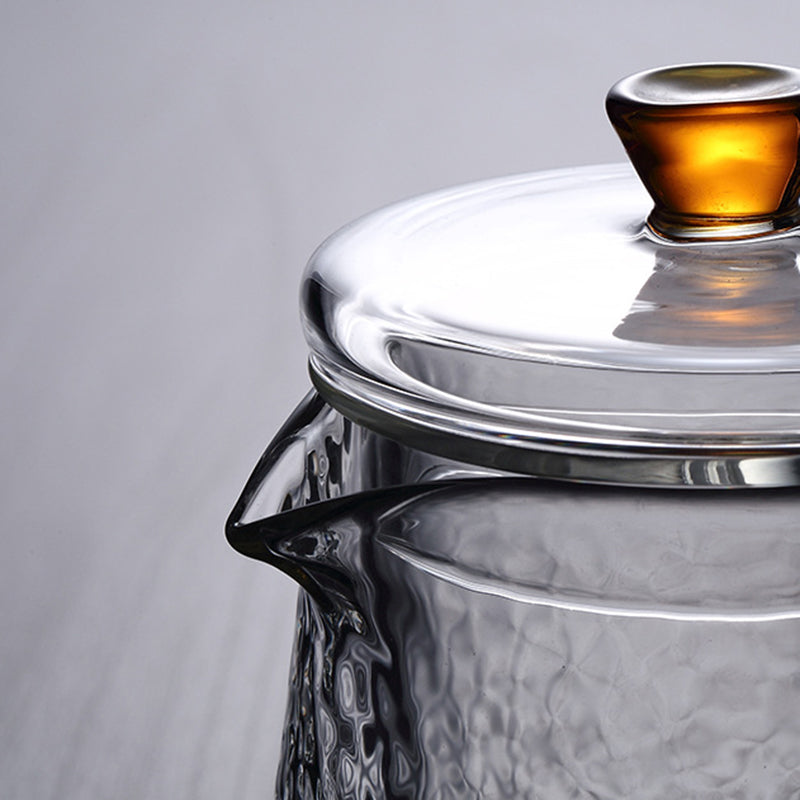 Høy kvalitet glass tekanne med metall infuser for servering i kjøkken og hjem.