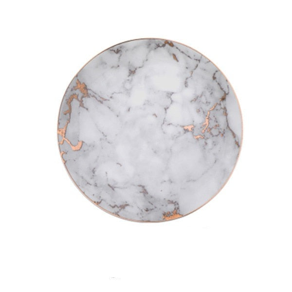 Elegant keramisk marmorplate for en luksuriøs spiseopplevelse hjemme. Perfekt for kjøkken og interiør.