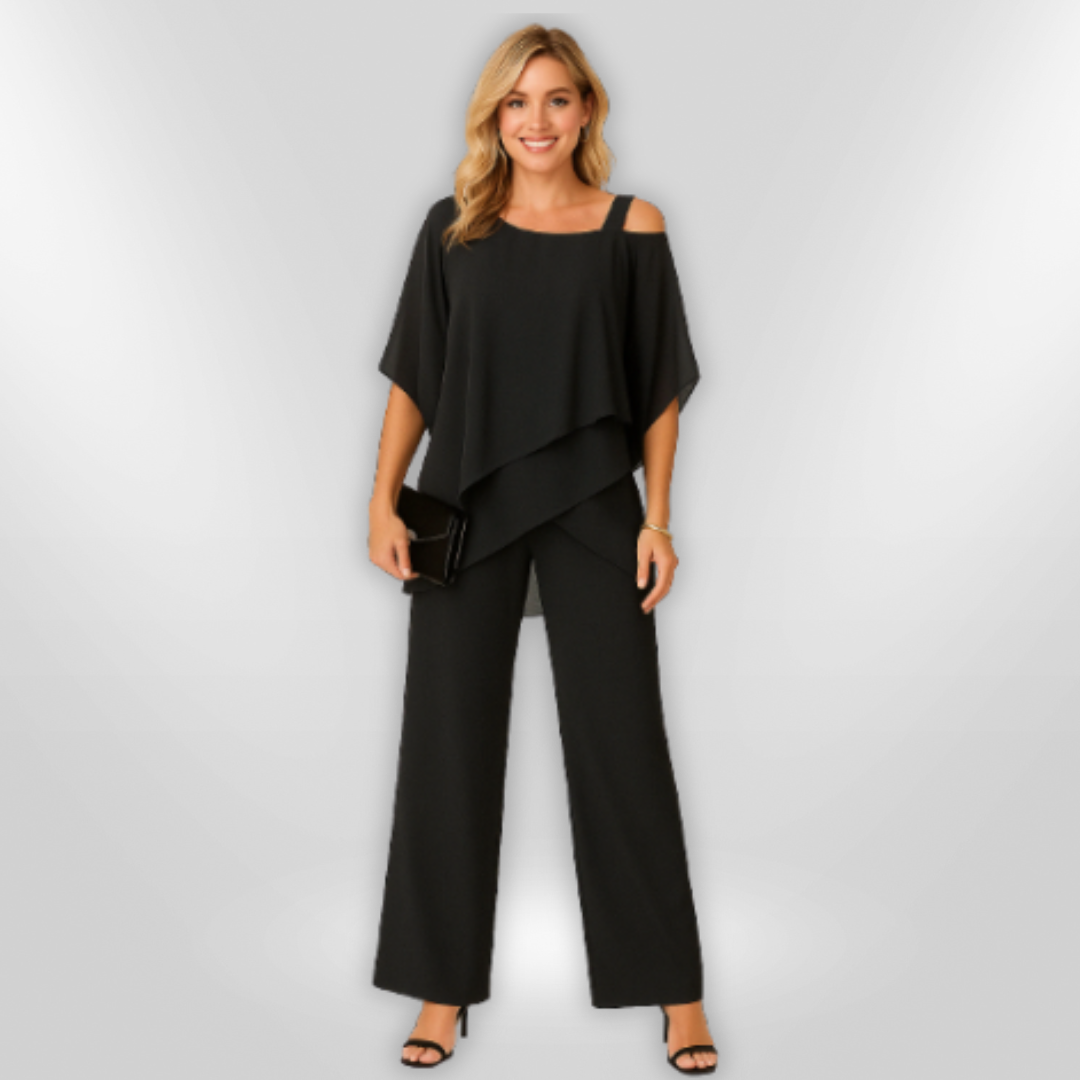 Stilfullt kvinneantrekk: asymmetrisk topp og komfortabel bredbukse, perfekt for sommerstil.