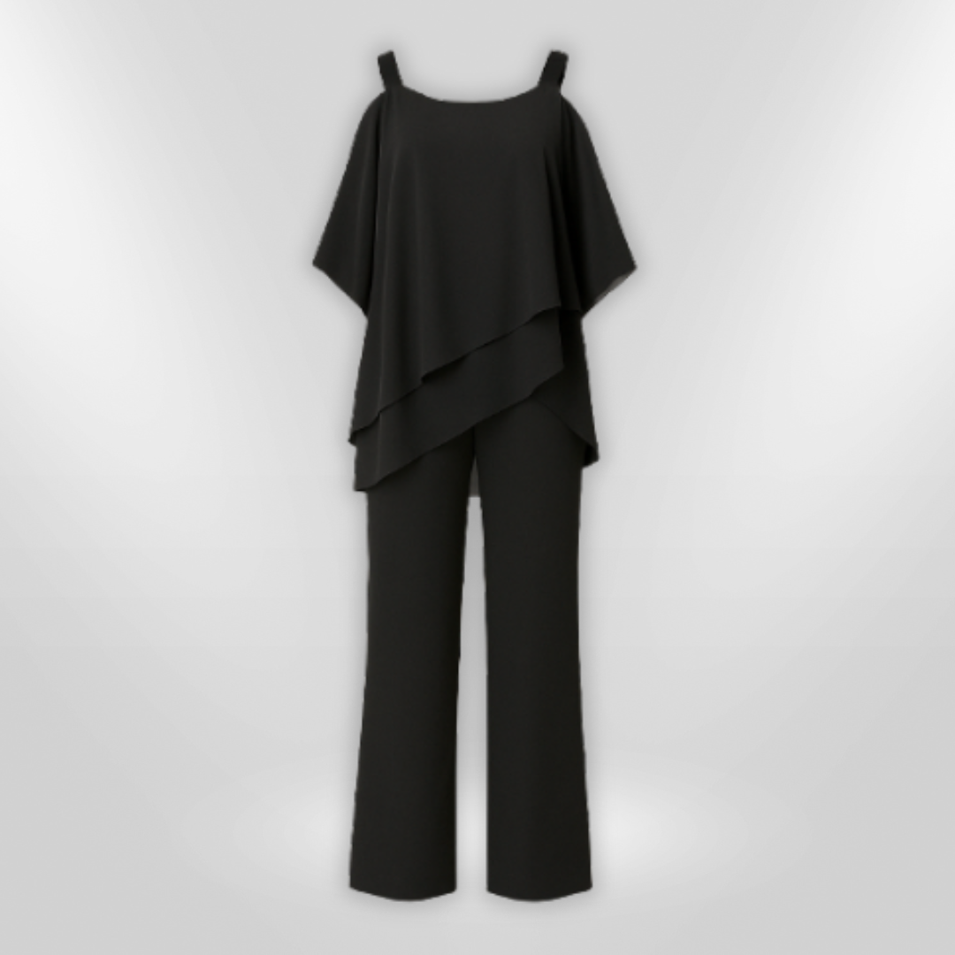 Formelt kvinne ensemble med moderne asymmetrisk overdel og flytende vide bukser.