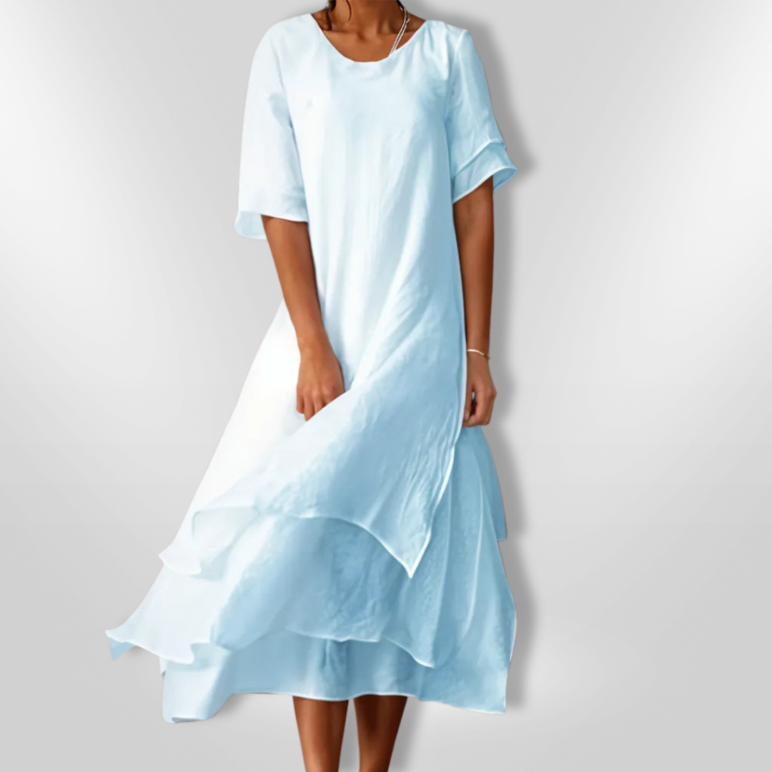Kvinnekjole med 3/4 ermer i myk, pustende bomull. Elegant robe for vår, sommer og fritid.