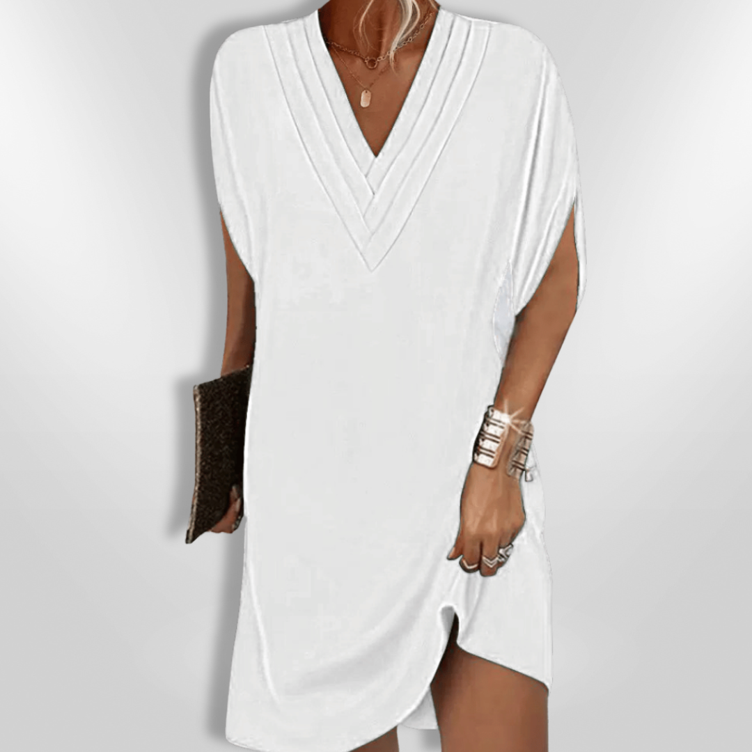 Chic og lang kvinners maxi kjole med et sofistikert drapert design. Komfortabel for en elegant stil.
