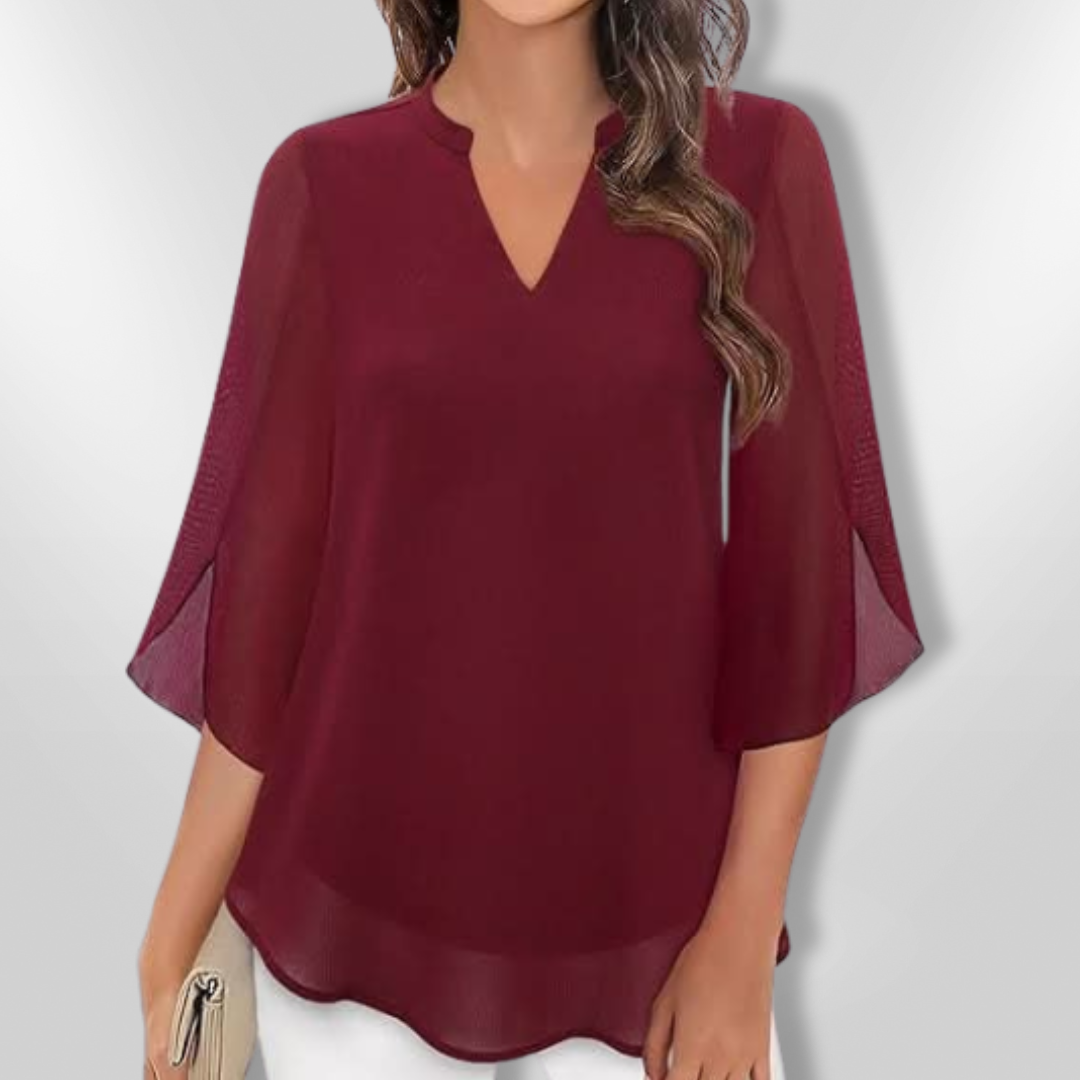 Stilig langermet kvinnebluse, ideell for både fest og kontor. Komfortabel og elegant.