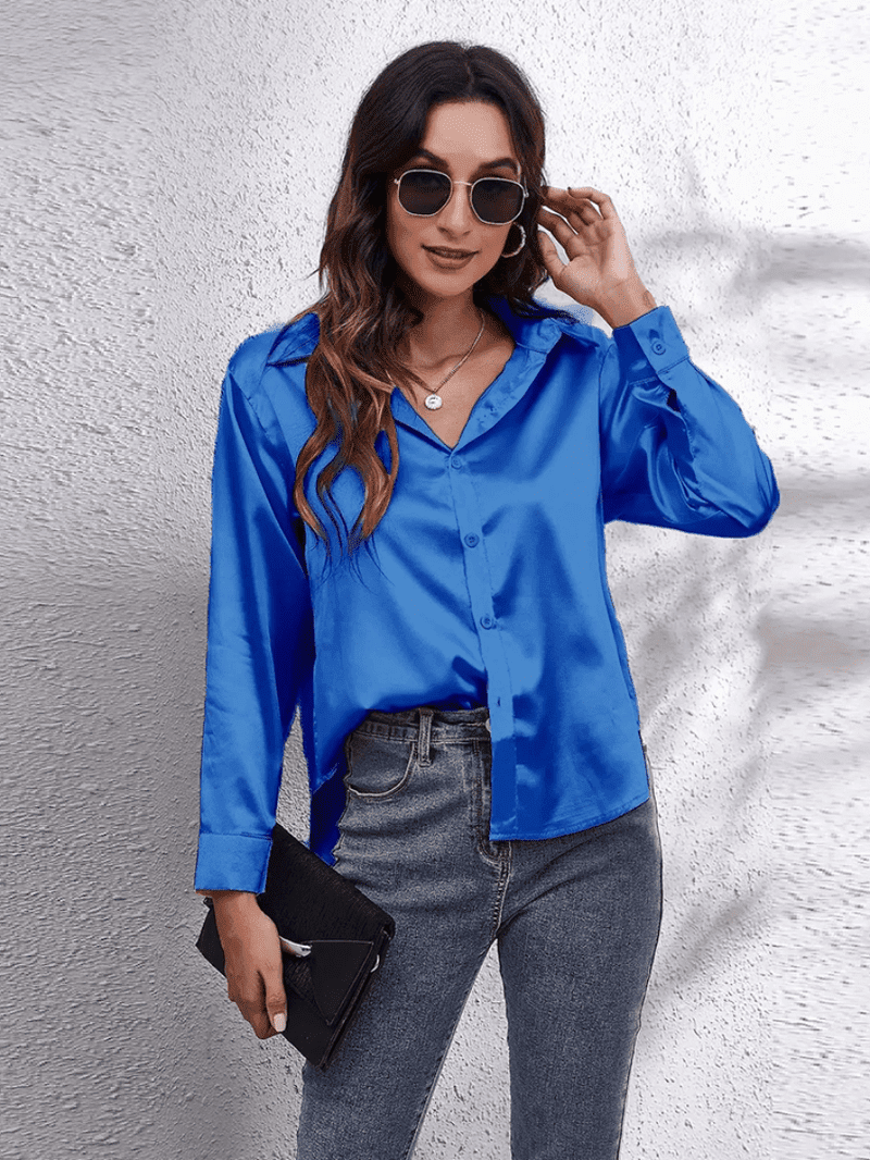 Klassisk damebluse med lange ermer, tidløs og komfortabel, for enhver kvinnes garderobe.