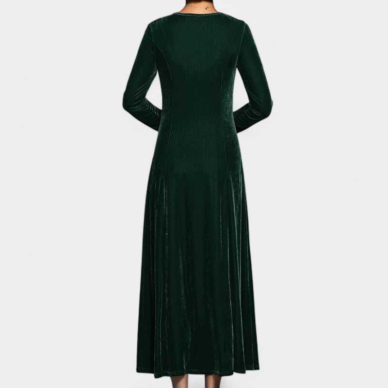 Nærbilde av stoffet på elegant midi kjole. Langermet kvinners a-linje kjole, myk og vaskbar kvalitet.