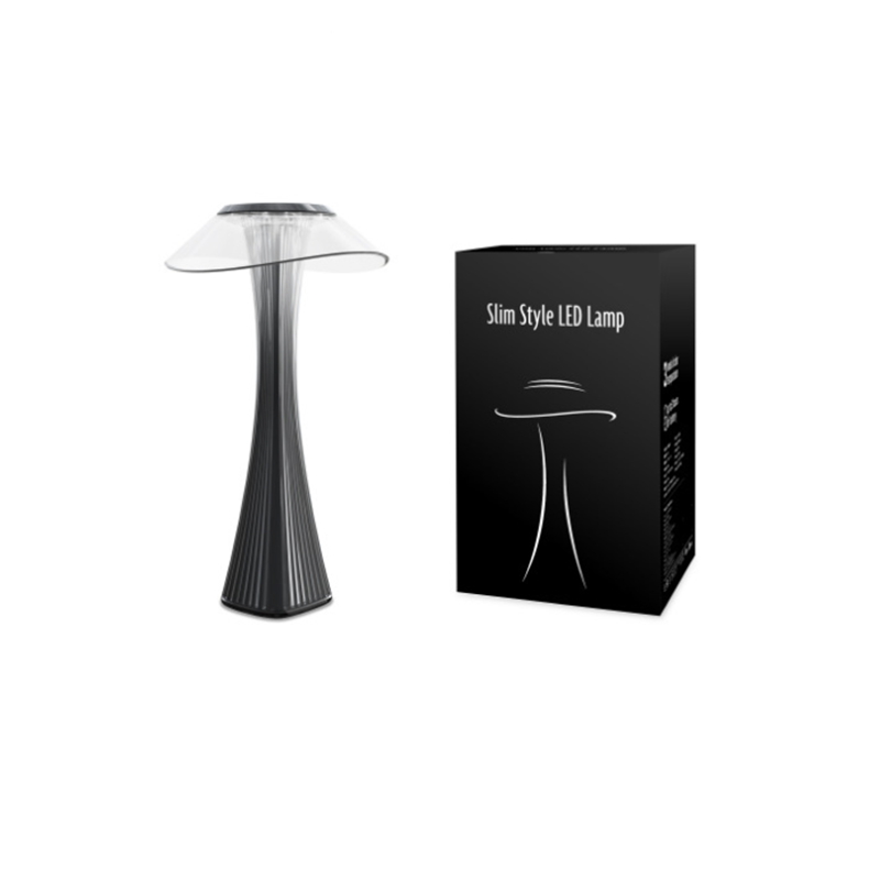 Elegant LED-diamantbordlampe med krystallstruktur, justerbar lysstyrke og trådløs USB-lading for moderne interiør.