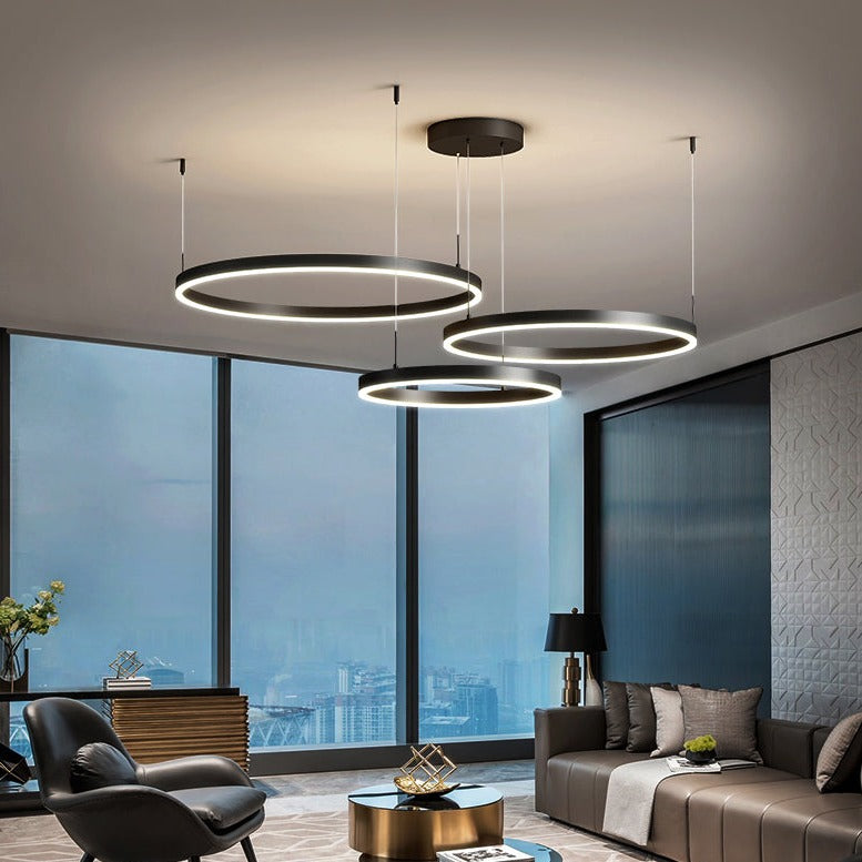 "Elegant LED ringlight taklampe i minimalistisk stil med sammenflettede ringer for moderne belysning."
