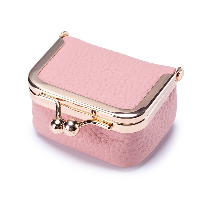 "Elegant mini smykkeskrin i ekte skinn med retro design, reisevennlig, tilgjengelig i flere stilige farger."