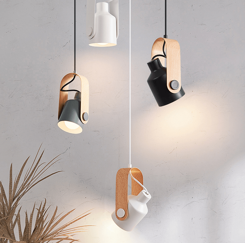 "Elegant nordisk pendellampe i tre og metall med moderne design. Ideell for ulike interiørstiler, gir sofistikert belysning."