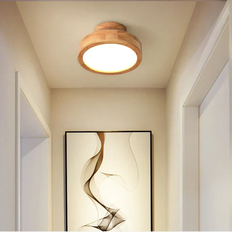 Design taklampe, rund form, gir varm og innbydende stuebelysning.