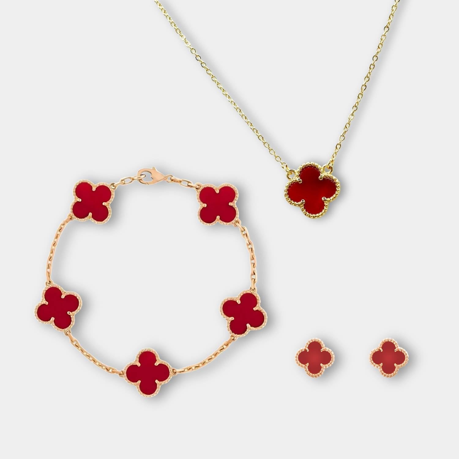 "Elegant smykkesett med minimalistisk halskjede, armbånd og øredobber i moderne design, ideelt for enhver anledning."