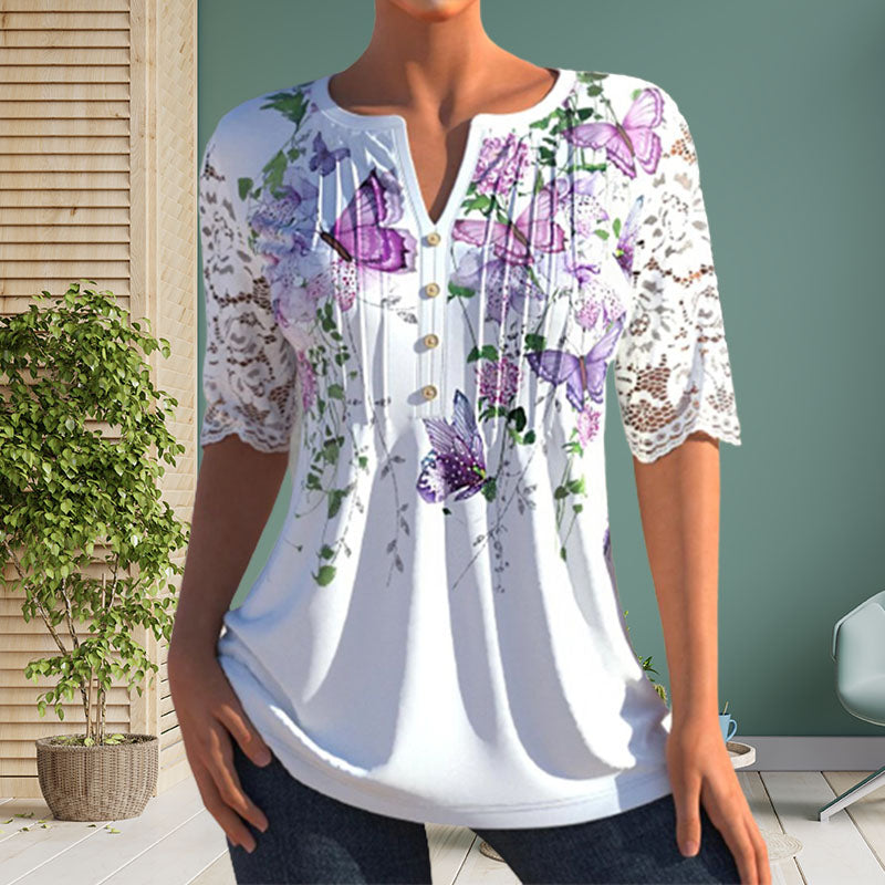 "Elegant V-hals bluse med blonder og blomstertrykk, feminine detaljer, ideell for hverdagsbruk og spesielle anledninger"