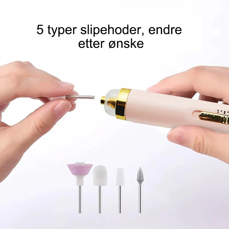 "Elektrisk manikyrsett med ergonomisk, slankt design. Inkluderer 5 utskiftbare hoder for enkel neglepleie."